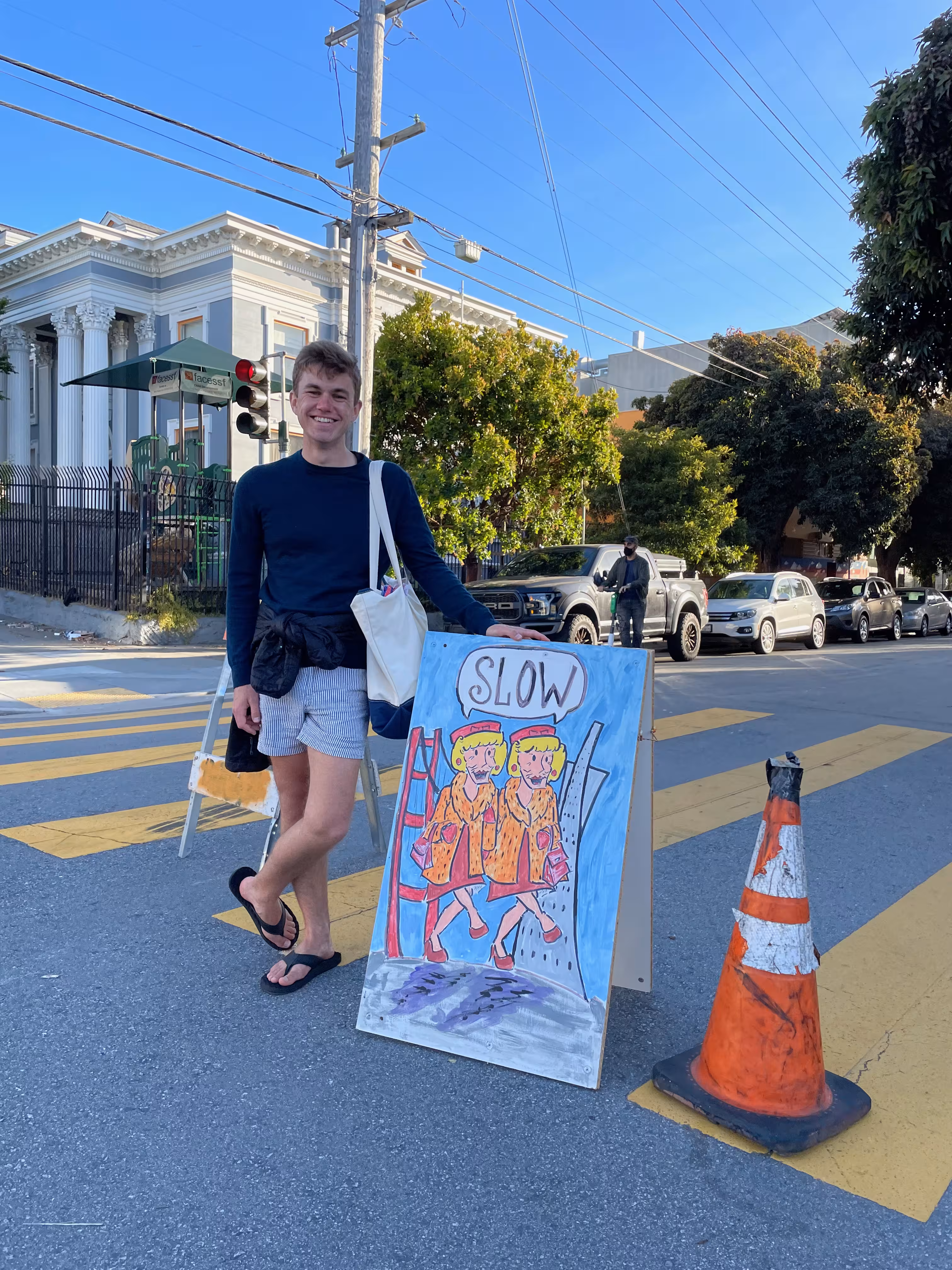 Posing with a community-provided art installation on Page and Masonic, summer 2021.