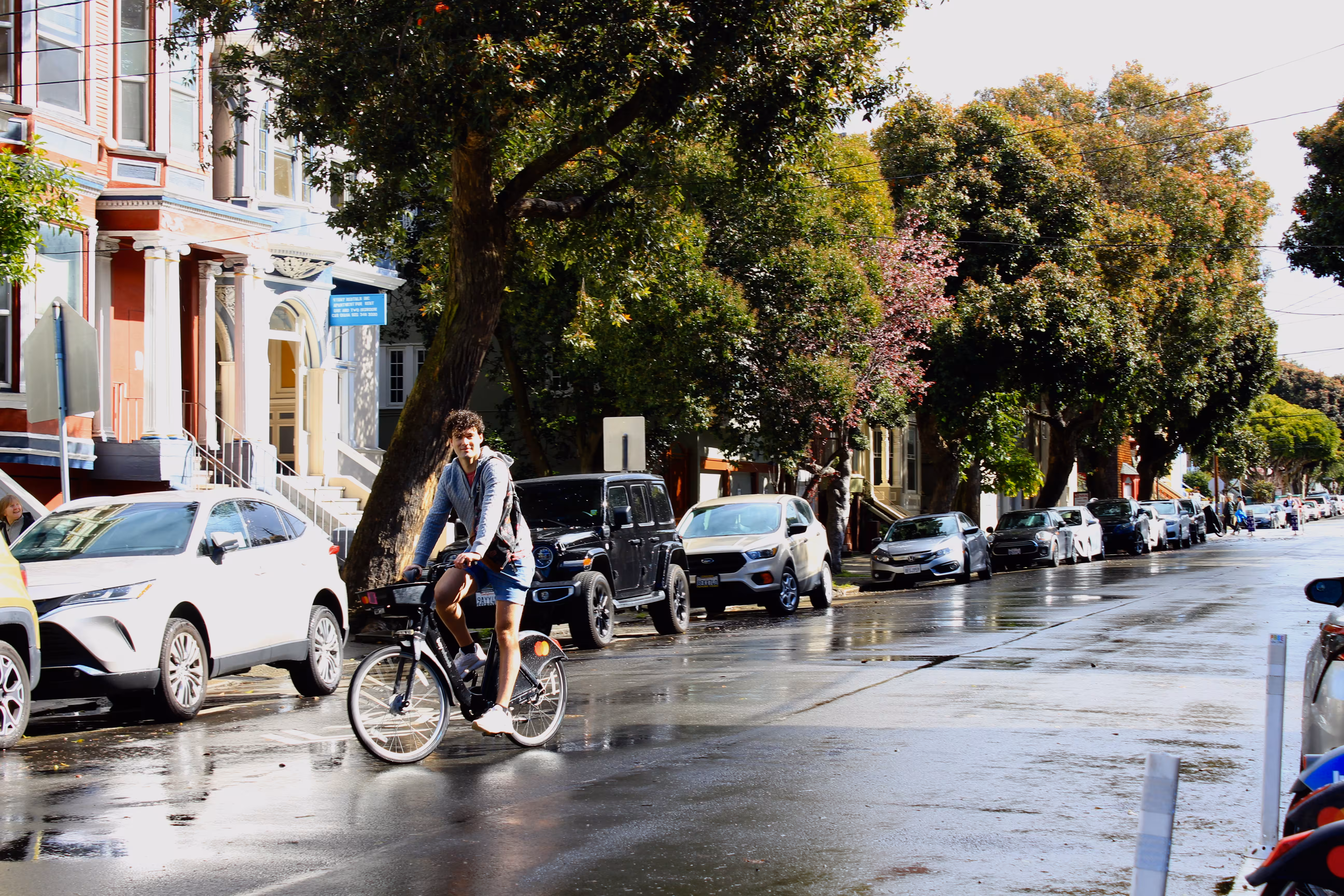 Unlocking bikes with a friend on Page Slow Street at Masonic.